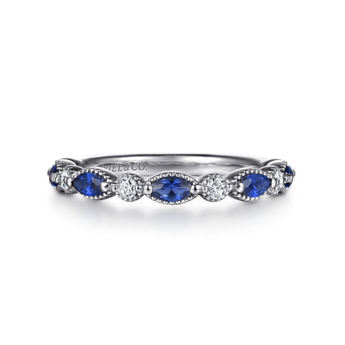 Gabriel & Co 14 Karat White Gold Marquise Cut Sapphire 0.50Tcw And Round Brilliant Cut Diamond 0.15Tcw Wedding Band
Ring Size : 6.5