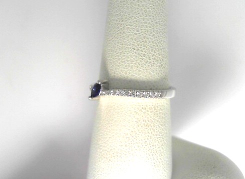 14 Karat White Gold  Fashion Ring With One Marquise Sapphire And 22=0.13Tw Round Diamonds 
Ring Size: 6.5