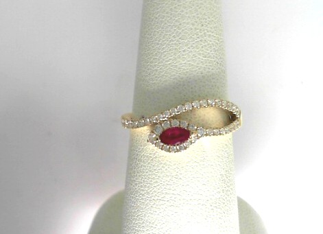 14 Karat Yellow Gold Fashion Ring With One 0.17Ct Marquise Ruby And 41=0.29Tw Round Diamonds
Ring Size: 6.5