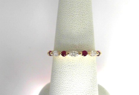 14 Karat Yellow Gold  Fashion Ring With 4=0.19Tw Round Rubys And 3=0.21Tw Marquise Diamonds
Ring Size: 6.5