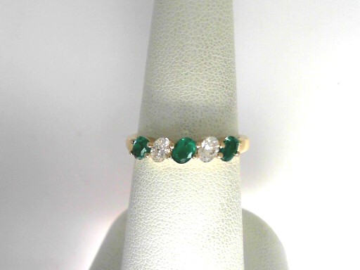 Yellow Gold 14 Karat 5 Stone Fashion Ring With 3=0.45Tw Oval Emeralds And 2=0.29Tw Oval Diamonds Name: Prong set
Ring Size: 6.5