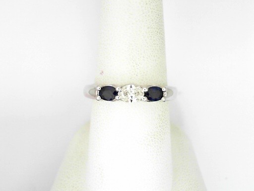 14 Karat White Gold 0.44 Cts Oval Shaped Sapphire And 0.31 Cts Oval Shape Cut Diamond Ring 
Ring Size: 7.5