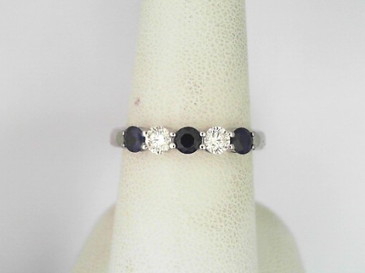 Platinum 0.27 Cts Round Brilliant Cut Diamond And 0.54 Cts Bagguette Cut Sapphire Ring 
Ring Size: 7.5