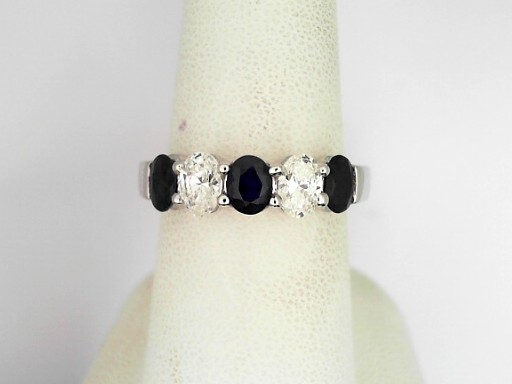 14 Karat White Gold 0.68 Cts Oval Brilliant Cut Diamond And 1.20 Cts Oval Cut Sapphire Ring 
Ring Size: 7.5