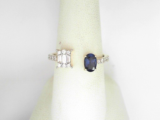 14 Karat Yellow Gold Oval Shape Sapphire 0.64 Cts And Multi Cut Diamond 0.34 Cts Open Space Ring 
Ring Size: 8