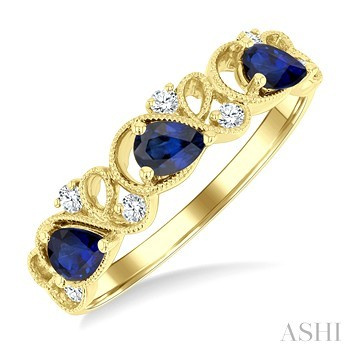 14 Karat Yellow Gold Pear Shape Sapphire And 0.10 ct Diamond Ring 
size 6.5