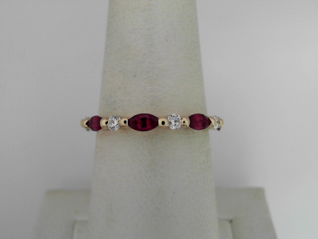 14 Karat White Gold Marquise Ruby And Round Diamond Band