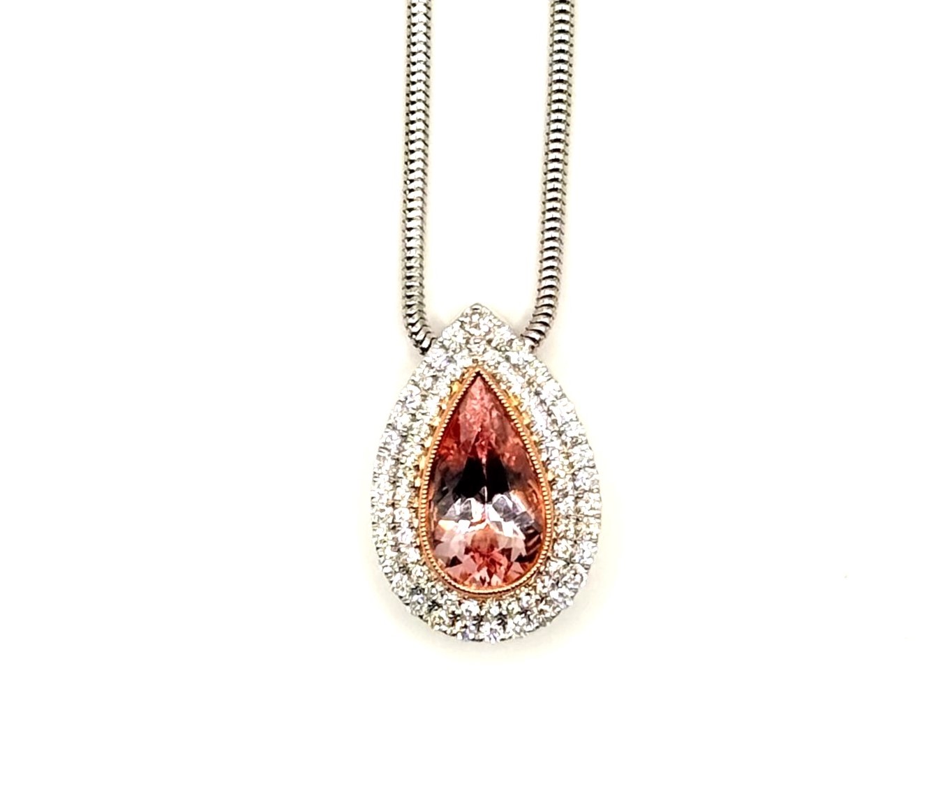 ESTATE  14 Karat White/Rose Gold Morganite  Pendant With 0.50Tw Round Diamonds (AS IS)
Snake Chain is 18 inches

11x7 mm  Morganite
32 diamonds .01 each
32 diamonds .005 each
Very Good Condition