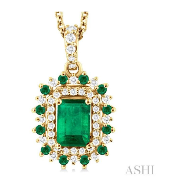 14 Karat Yellow Gold 6 X 4 Emerald Cut Emerald Pendant With 1.5 mm Round Emeralds And 0.20 Ct Diamonds  18 Inch