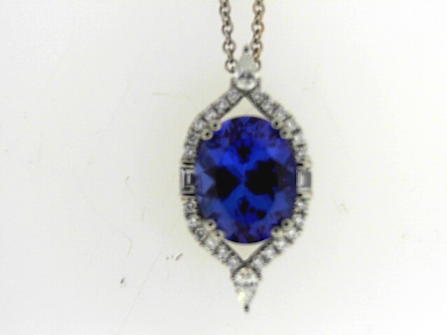 Platinum Halo Pendant With One 3.40Ct Oval Tanzanite And 28=0.31Tw Round,Pear & Baguette F/G VS2-Si1 Diamonds 
On 18 Karat Gold 15.5