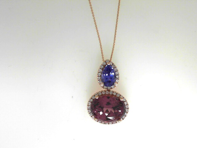 14 Karat  Rose Gold  Halo Pendant With One 7.X5mm Pear Tanzanite And One 12X9mm Oval Garnet
Length: 18