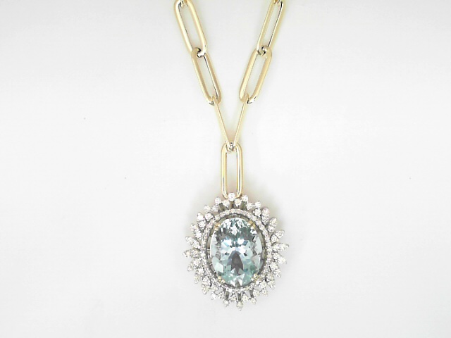 14 Karat Yellow And White Gold 7.19 Cts Oval Shape Cut Aquamarine And 0.91 Cts Round Brilliant Cut Diamond Pendant 
14 Karat Yellow Gold Paper Clip Chain 
Length: 18 Inch