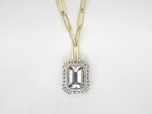 14 Karat Yellow And White Gold 3.63 Cts Emerald Cut Aquamarine And 0.86 Cts Round Brilliant Cut Diamond Pendant 
14 Karat Yellow Gold Paper Clip Chain 
Length: 18 Inch