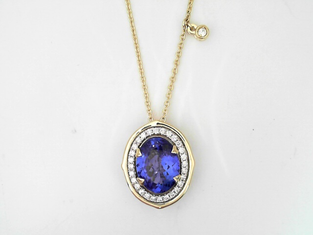 14 Karat Yellow Gold And Platinum 4.45 Cts Oval Shaped Tanzanite And 0.26 Cts Round Brilliant Cut Diamond Oval Shaped Pendant 
Length: 18 Inch