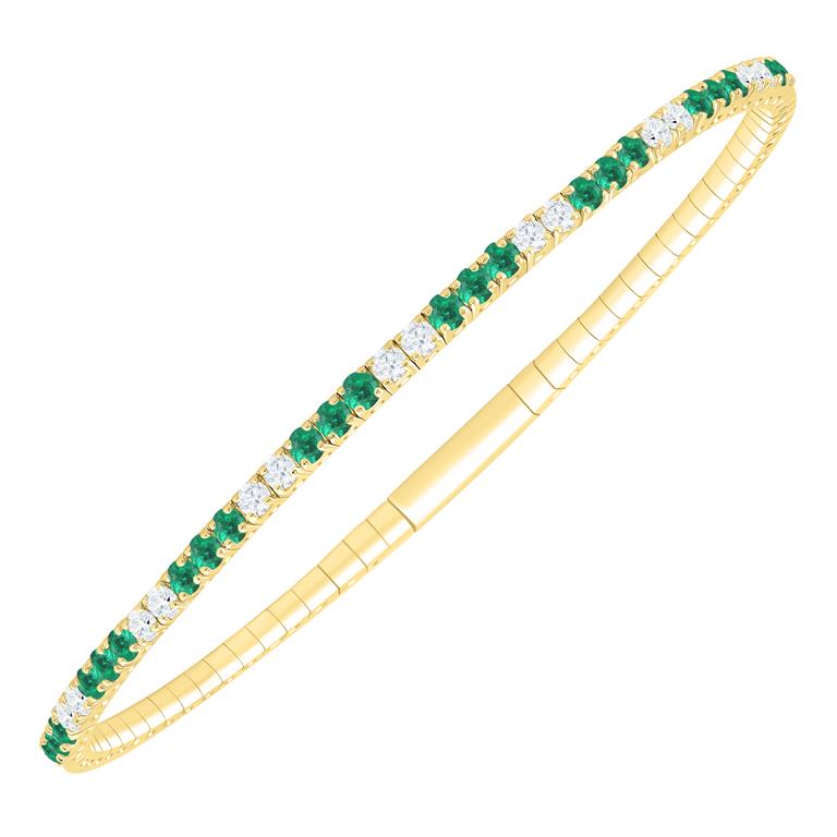 14 Karat Yellow Gold Flexible Bangle Bracelet With 19=0.73Tw Round Emeralds And 18=0.76Tw Round Diamonds