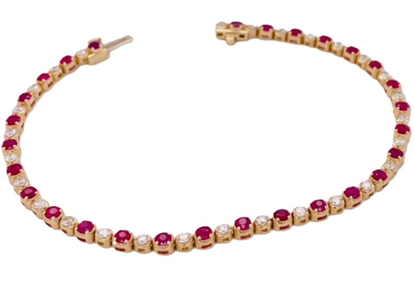 14 Karat Yellow/White Gold Bracelet With 28=2.29Tw Round Ruby Gemstones And 28=0.92Tw Round Diamonds
 Length: 7
