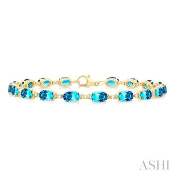 10 Karat Yellow Gold 6 X 4 Oval Blue Topaz And 0.15 ct Diamond Link Bracelet
7 Inch