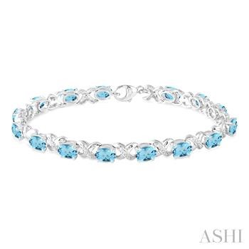 Sterling Silver 7.00X5.00 Mm Oval Blue Topaz And 0.05 ct Round Diamond Bracelet
7 inch