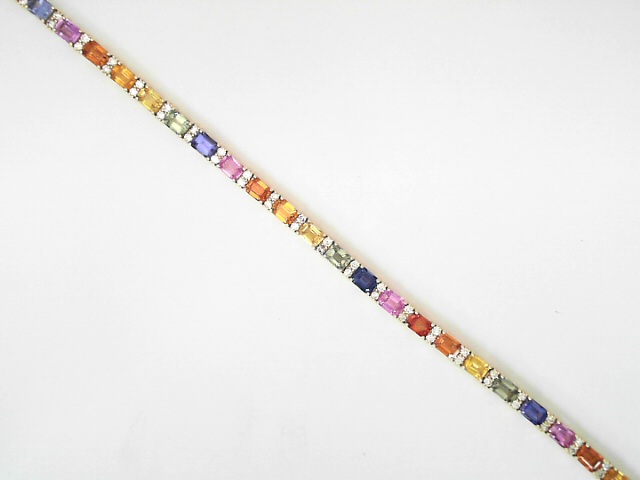14 Karat Yellow Gold 7.7 Cts Emerald Cut Multi Color Sapphire And 0.74 Cts Round Brilliant Cut Diamond Line Bracelet 
Length / Size : 7 Inch