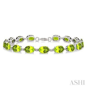 Sterling Silver Oval Shape 7 X 5 Peridot And 0.08 ct Diamond Link Bracelet 
7 inch