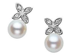 Mikimoto18 Karat White Gold Stud Earrings With  2= 5.5mm A+ Quality Akoya Pearls And  8=.04Ct Diamonds