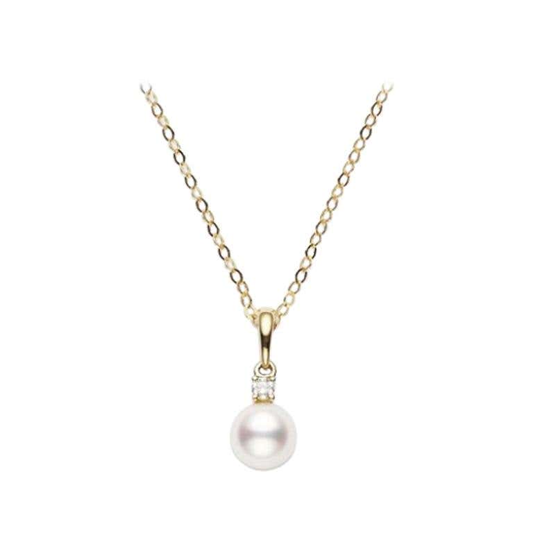 Mikimoto 18 Karat Yellow Gold Pendant With One 7 x 7.5 mm Akoya Pearl And One 0.05Ct Round Diamond 18 Inch Length