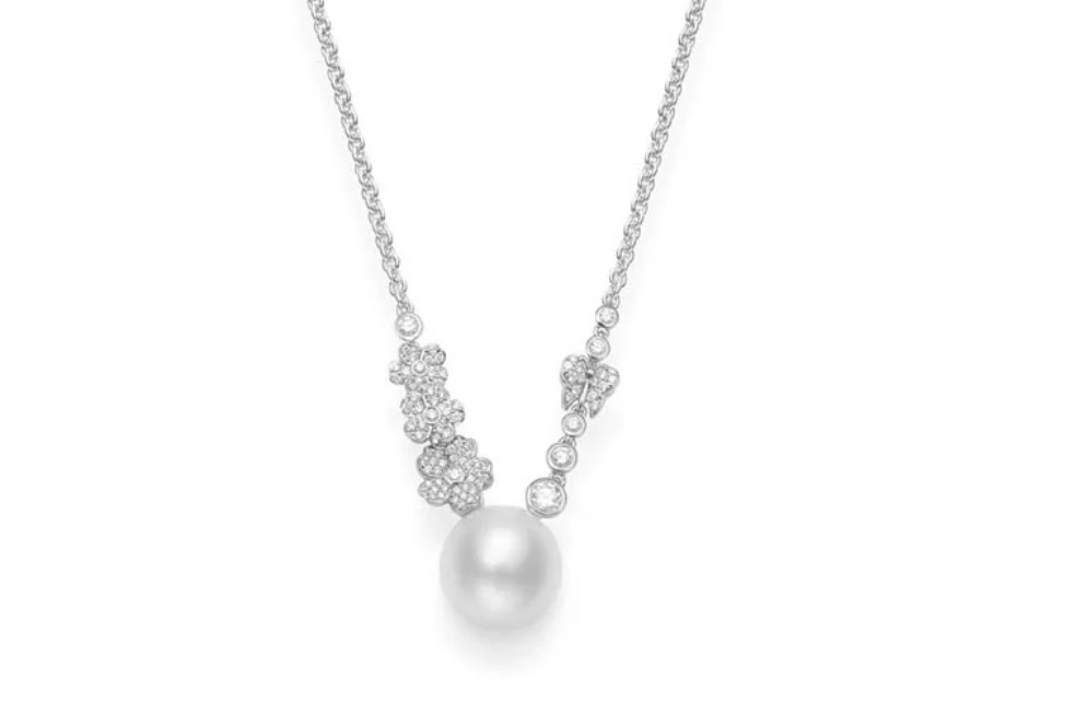Mikimoto 18 Karat White Gold Cherry Blossom 12 Mm A+ White South Sea Pearl Pendant With Round Brilliant Cut Diamonds 0.53 Cts 
Length: 16 - 18 Inch