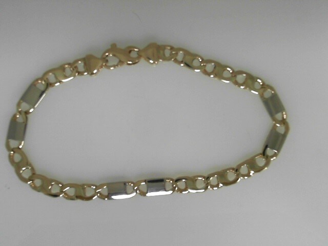 Estate 14 Karat YellowFancy Link Bracelet With White Gold Bars (AS IS)
Length: 8