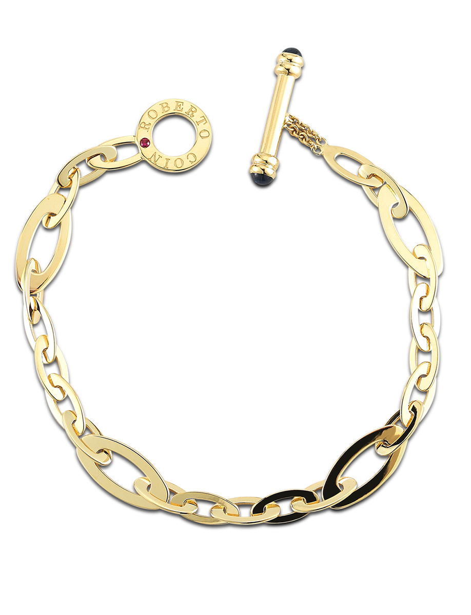 Estate 18 Karat Chic & Shine link bracelet by Roberto Coin (AS IS)
2 cabochon blue sapphires, approx. .20cts
1 round red ruby, approx. .3cts