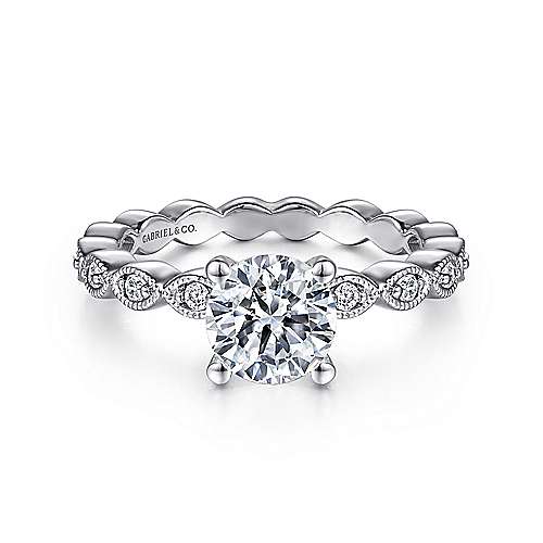 14kw .26cttw Milgrain Leaf Design Shank Eng Ring Mounting w/Dia Accent Gallery    Sparkling round diamonds are nestled into marquise frames with milgrain borders all along the band of this antique-inspired round cut engagement ring.