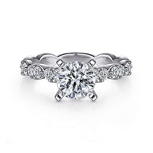 -14kw .45cttw Double Dia Leaf Design Shank Eng Ring Mounting    The band of this delightful engagement ring is fashioned into marquise shapes  each studded with a pair of round diamonds.
