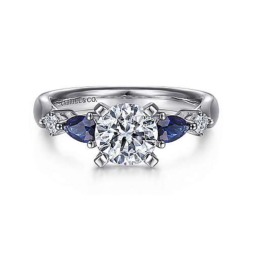 -14kw .56cttw Sap/.09cttw Dia Eng Ring Mounting    The elegance of a vintage ring with a contemporary flair. This straight styled engagement ring is adorned with diamond and sapphire side stones to highlight your flawless center stone.