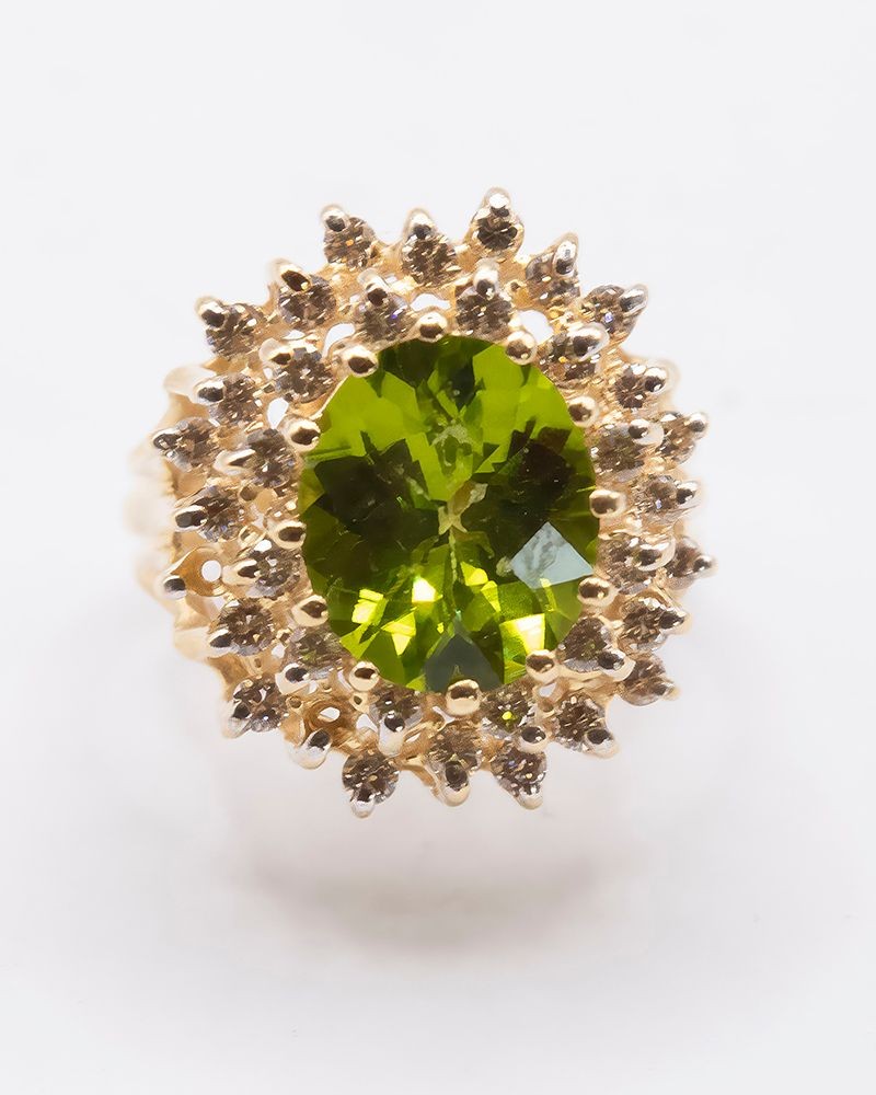 18kt yellow Gold Oval 4.75ct Peridot & Diamond Cluster Ring.
