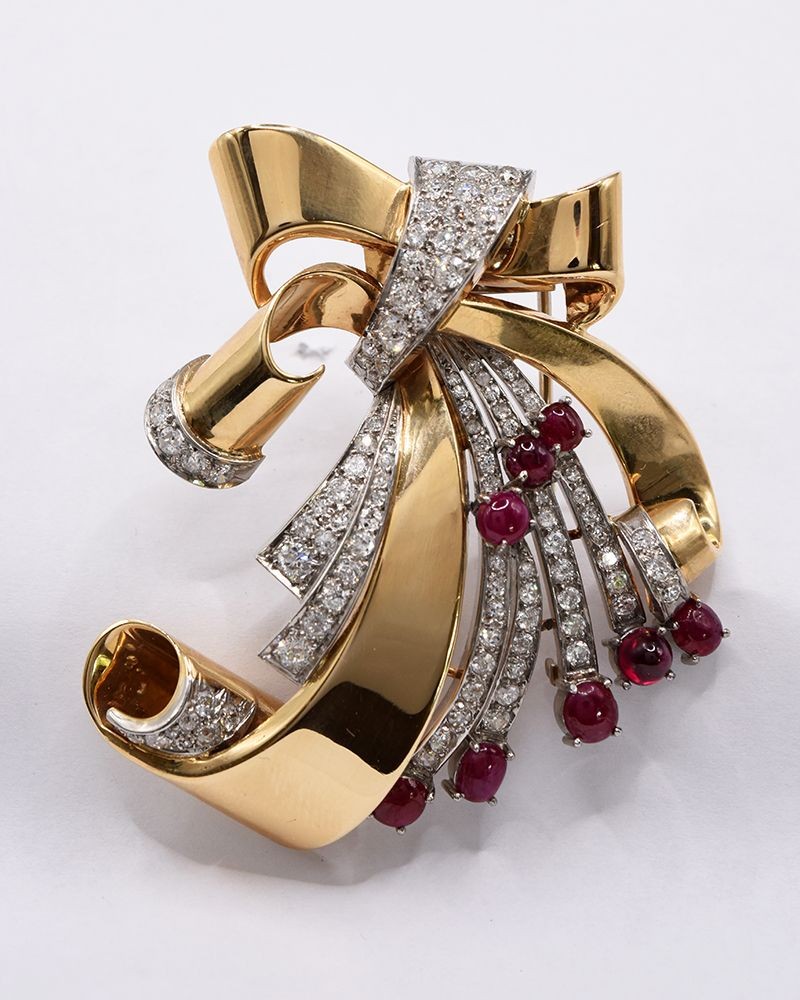 Estate 14kt Yellow Gold 1940s Retro Ruby & Diamond Ribbon Spray Brooch.
