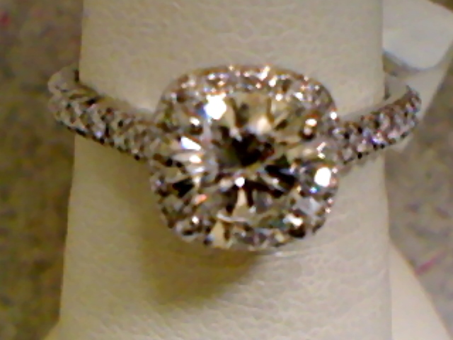 RND HALO ENG RINGDMTG1517 / DLCTR0244 CENTER                                  DIAS IN MNTG ARE GH/SI2 .30CTW