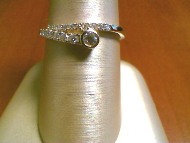 1/4CT RND DIA BEZEL RING