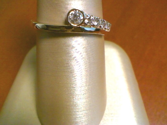 1/4CT DIA ONE SIDE BYPASS RING