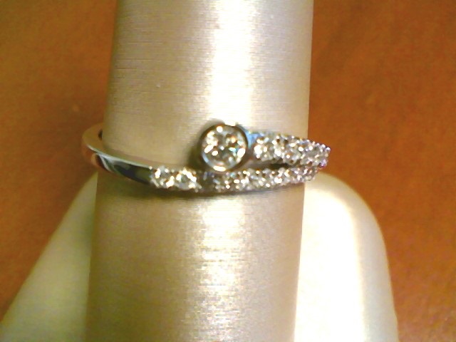 1/4CT DIA BEZEL RING