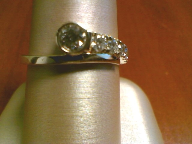1/2CT RND DIA ONE SIDE BYPASS RING