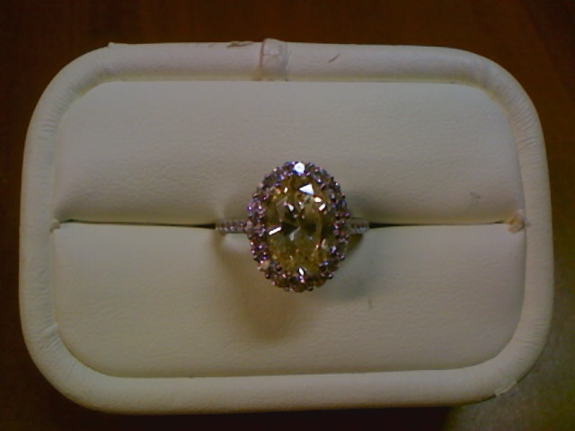 OVAL YELOW HALO RING