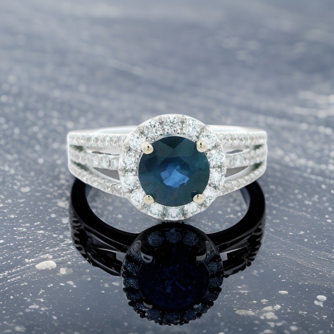 EMJ Halo Ring, 1 Round Sapphire 1.25ct, Round Diamond 0.74ct  E-F VS1-VS2, 18K White Gold 6.07g