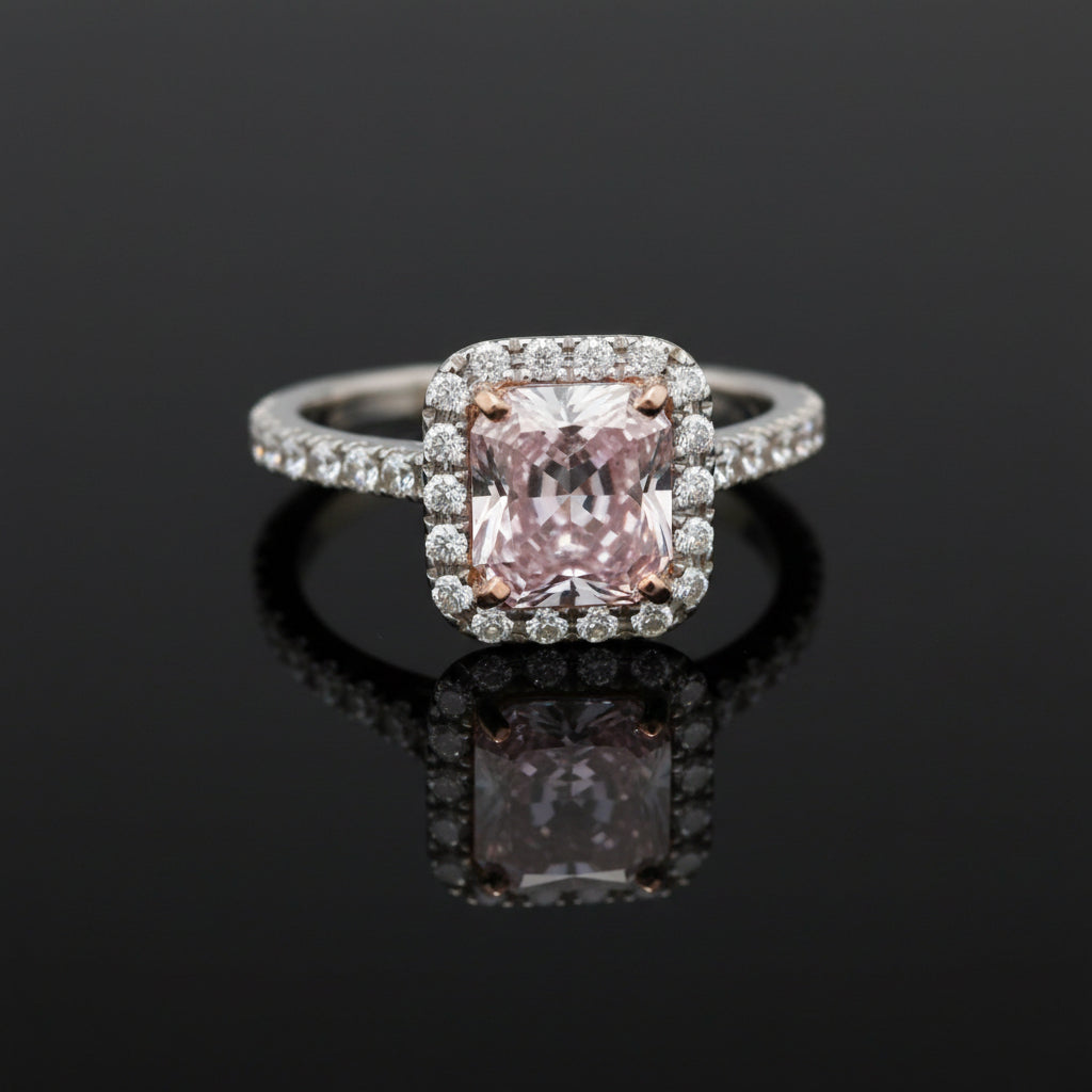 Estate Ring, 1 Radiant Cut Diamond 1.81ct Fancy Light Pinkish Purple SI2 GIA #5222919647, 48 Round Brilliant Cut Diamond 0.63cttw G-H VS2-SI1, 18K/PLAT 4.74g. All Weights Estimated.