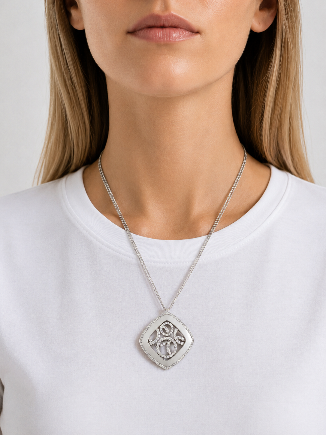 Designer EG Necklace Round Brilliant Cut Diamond 1.01cttw  G-H VS2-SI1 18K White Gold 14.16g. All weights estimted.