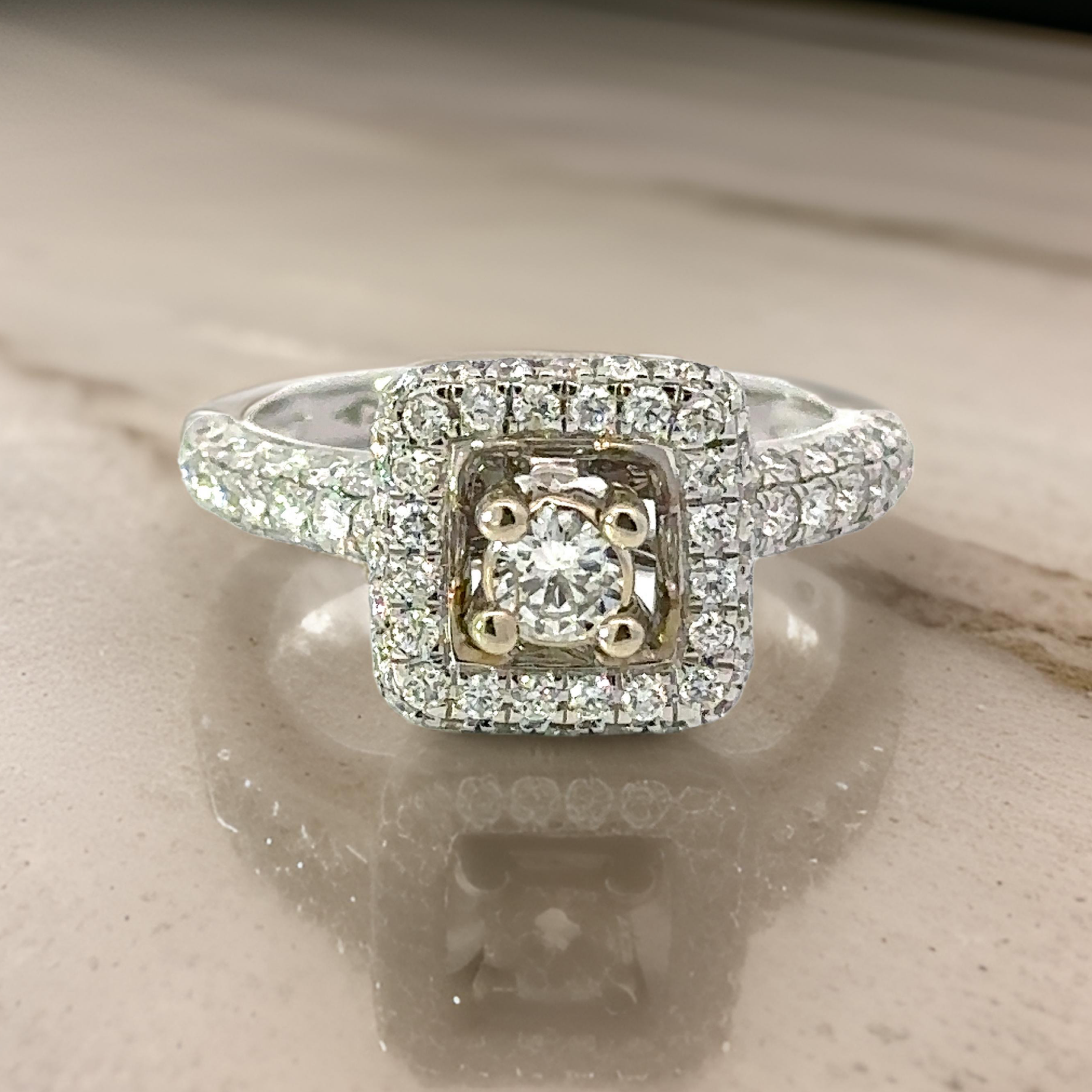  Ring, 1 Round Diamond 0.26 ct G-H SI1-SI2,  Round Diamond 1.08 cttw  G-I VS2-SI2, 14K White Gold 4.80g