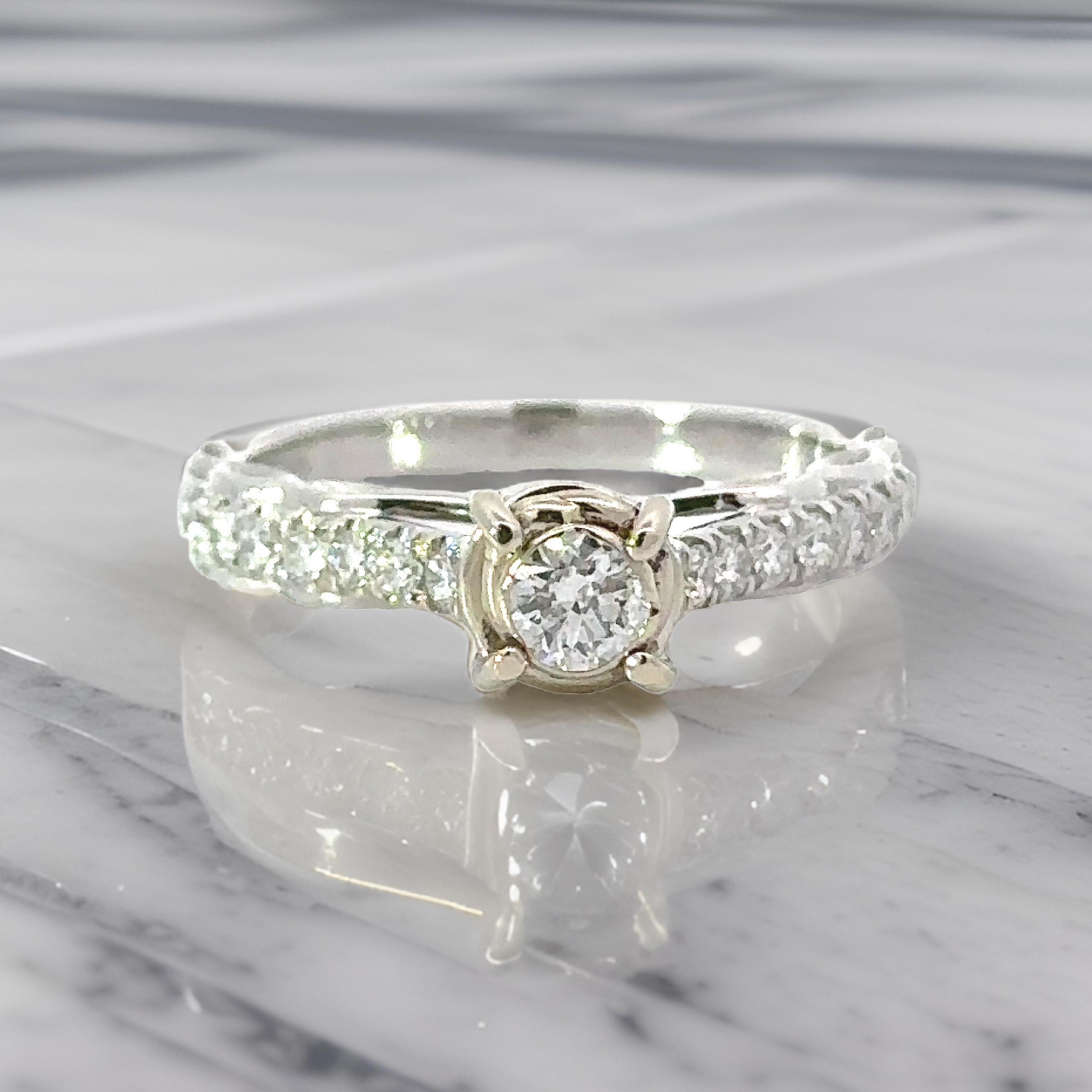 Maya Lianna Ring, 1 Round Diamond 0.25 ct G-H SI1-SI2, 14 Round Diamond 0.30 cttw  G-H SI1-SI2,  14K White Gold 2.90g