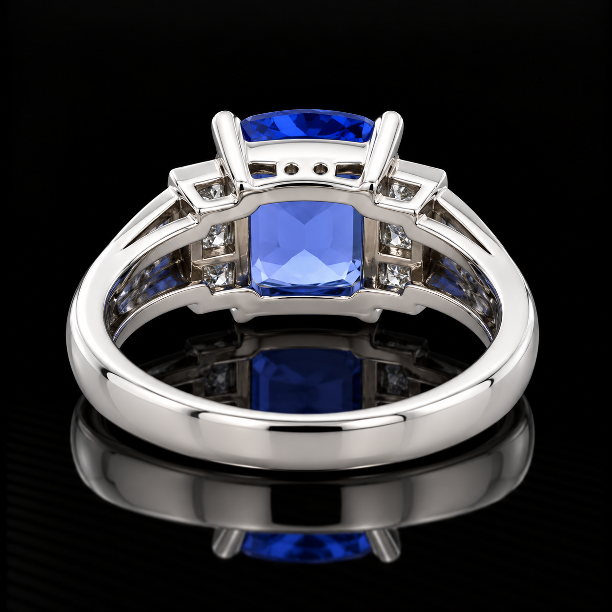 Estate Ring, 6 Princess Cut Diamond 0.28 cttw  G-H VS1-SI1,1 Tanzanite Cushion Modified 3.18 ct  Platinum 6.66g. All Weights Estimated.
