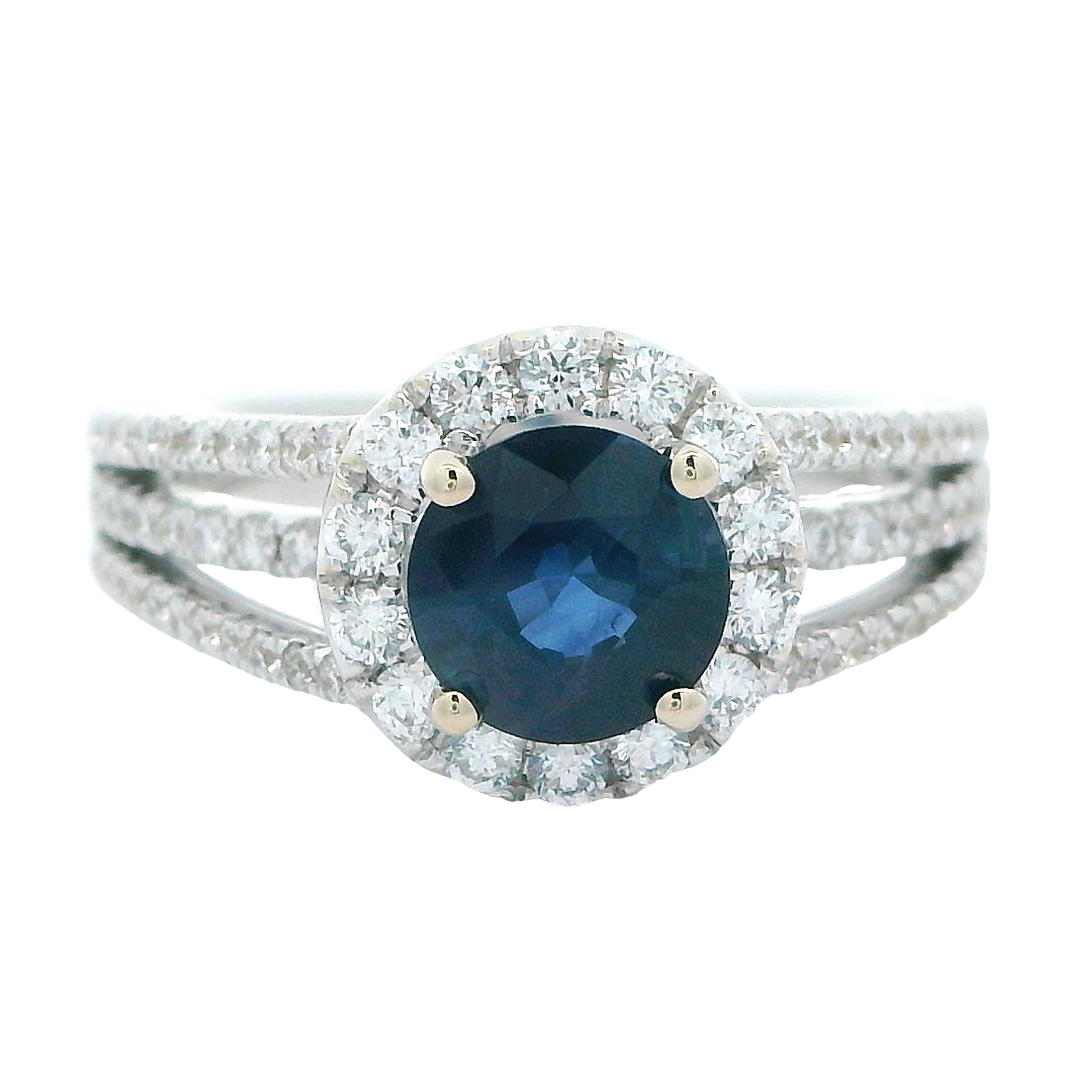 EMJ Halo Ring, 1 Round Sapphire 1.25ct, Round Diamond 0.74ct  E-F VS1-VS2, 18K White Gold 6.07g