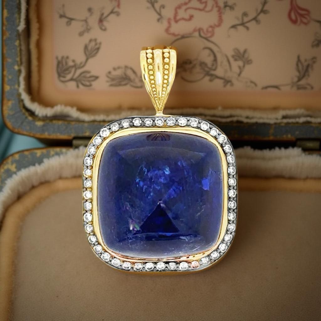 Estate Pendant, 1 Sugar Loaf Cut Tanzanite 53.20 ct, 69 Round Diamond 1.08 cttw G-H VS1-SI1, 18K Yellow Gold 16.87g