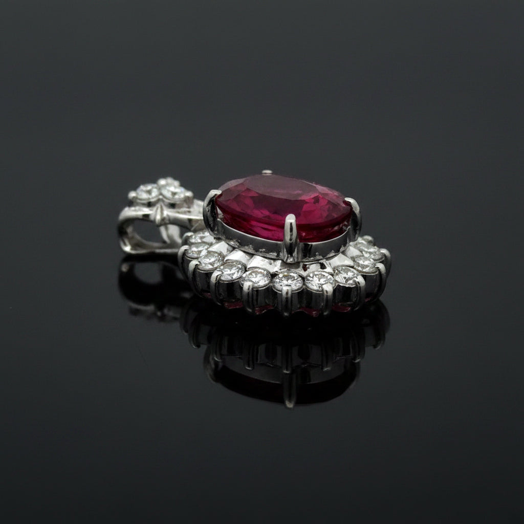 Estate Pendant, Round Brilliant Cut Diamond 0.50 cttw  G-H VS2-SI1,1 Rubellite Tourmaline Oval 3.23 ct  Pink to Red GIA #1232981055 Platinum 6.06g. All Weights Estimated.