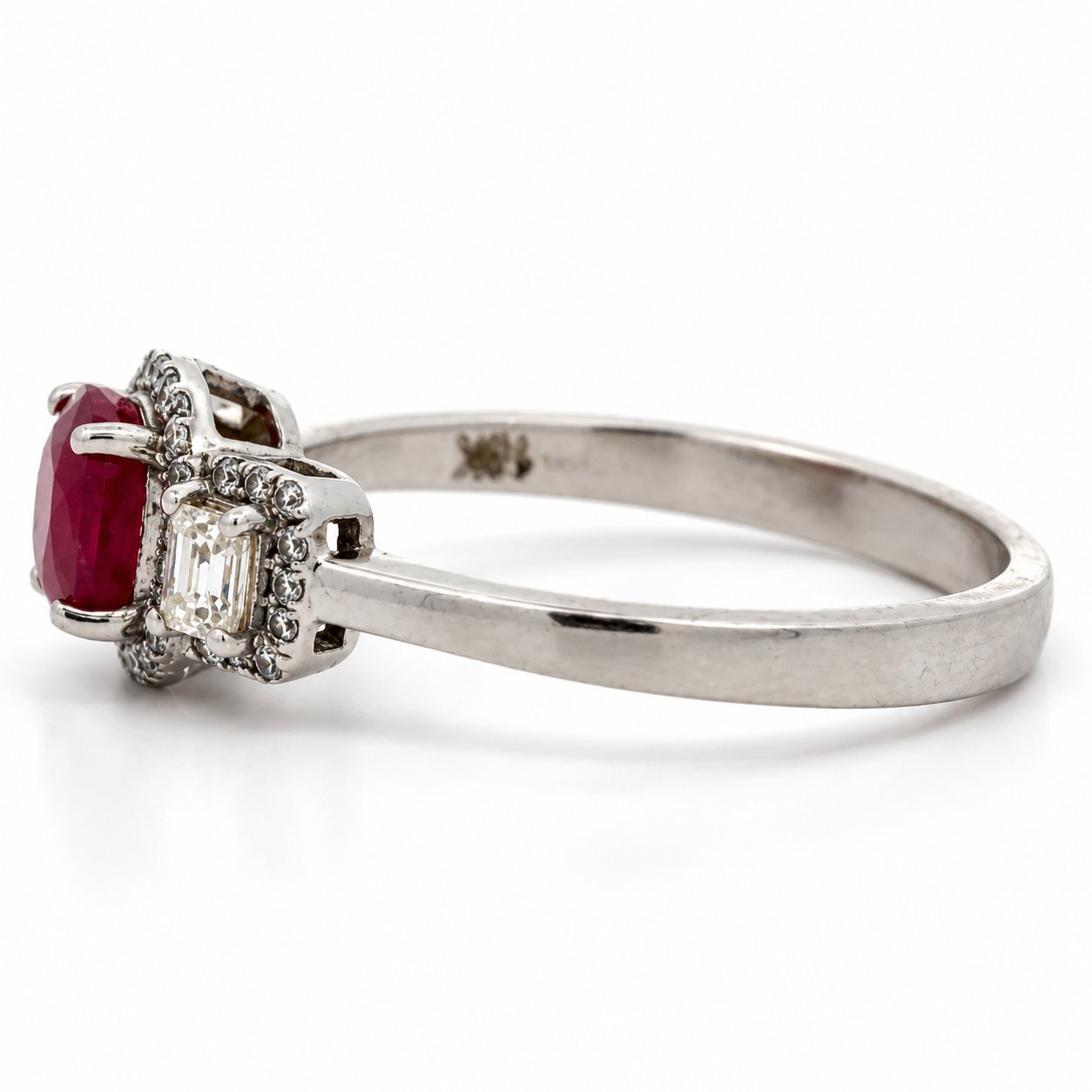 Estate Ring, Round/Baguette Cut Diamond 0.35 cttw  G-H SI1-SI1,1 Ruby Oval 1.05 ct  18K White Gold 3.46g. All Weights Estimated.